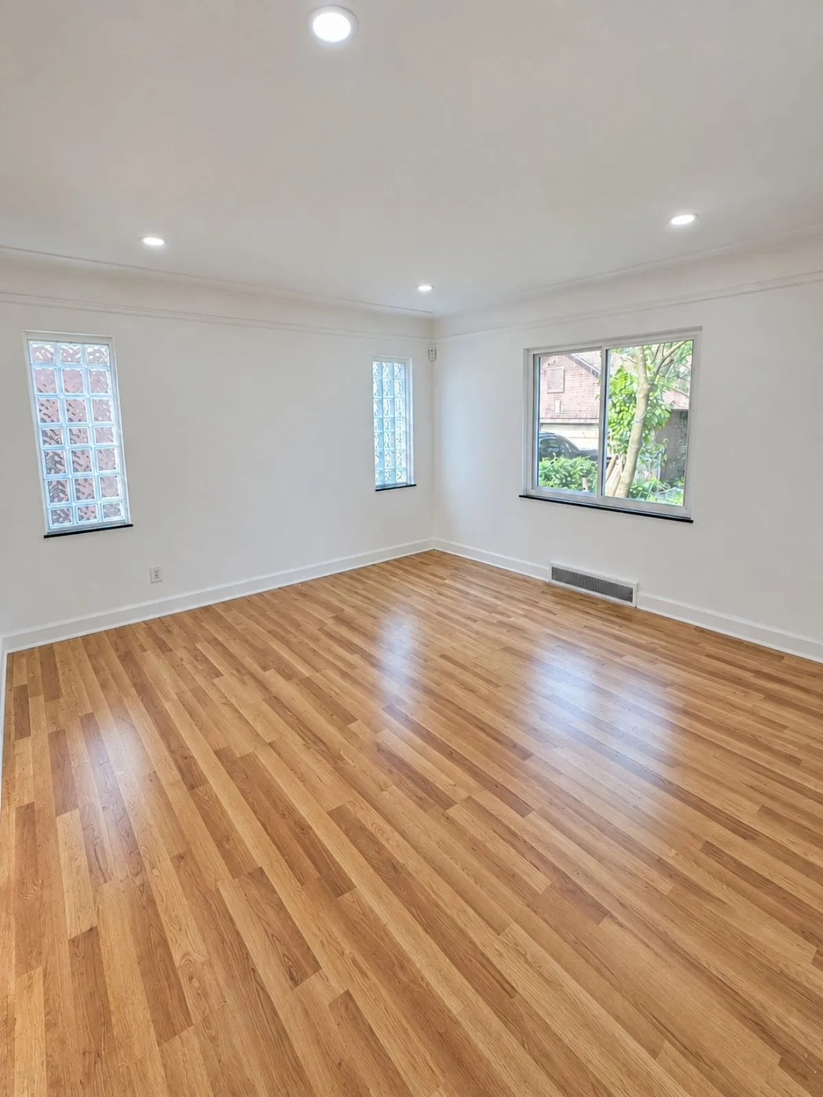 The same room with finished wood flooring